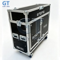 Flight case de transport sur roues avec système de levage hydraulique personnalisé pour console de mixage numérique Midas M32, avec compartiment de rangement