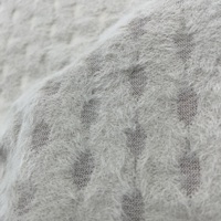 Tissu tricoté en nylon et élasthanne beige doux, imitation fourrure de lapin, extensible et moelleux, idéal pour les sous-vêtements et les cardigans d'automne-hiver pour femmes