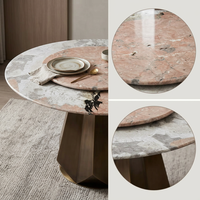 Table à manger ronde avec plateau en marbre rose Pandora, base géométrique dorée, mobilier moderne de luxe pour salon