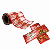 Film plastique alimentaire personnalisé en rouleau pour machine automatique de conditionnement de sachets scellés à l'arrière pour sauce ketchup et sauce chili