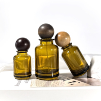 Pompe de pulvérisation vide en gros 30ml 50ml 100ml cylindre rond emballage cosmétique huile essentielle brun bouteille de parfum de luxe