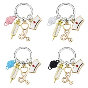 Mignon blanc médical ange porte-clés métal émail infirmière médecin porte-clés dessin animé seringue stéthoscope porte-clés pendentif - Product Image 6