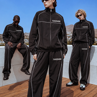 Ensemble de survêtement pour homme en nylon à col montant, avec veste de sport zippée intégrale et pantalon ample, idéal pour le voyage, avec éléments réfléchissants