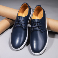 Chaussures de skate pour hommes baskets chaussures de skate en cuir microfibre bas à lacets appartements rétro fait à la main trou d'air évider mâle