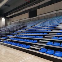 Sièges de tribune connectés au stade avec coque en plastique durable et cadre métallique pour les arènes de football et de basketball