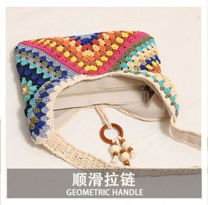 Bolso de mano de algodón de moda, nuevo diseño calado, bolso de playa para mujer con borlas de cuentas de madera - Product Image 5