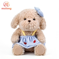 Peluche chien assis mignon avec robe à imprimé cœur, jouet en peluche doux pour filles, cadeau d'anniversaire pour enfants, décoration d'intérieur, vente en gros