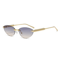 Nouvelle mode lunettes de soleil œil de chat pour hommes femmes Internet célébrités Style Orange cadre Tac métal Rivet jambe lunettes de soleil sans cadre