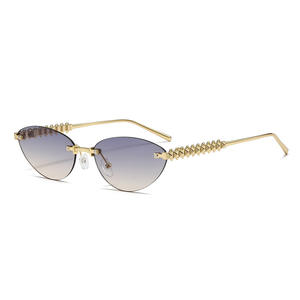 Nouvelle mode lunettes de soleil œil de chat pour hommes femmes Internet célébrités Style Orange cadre Tac métal Rivet jambe lunettes de soleil sans cadre - Product Image 4