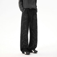 Jeans noirs de haute qualité à coupe courbée, style streetwear américain, avec broderies et rivets