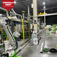 Ligne de manutention robotisée efficace, robot industriel pour le chargement et le déchargement des lignes de soudage de réservoirs internes