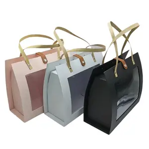 Bolsa de papel con logotipo impreso personalizado Ropa de lujo Bolsas de papel para compras Boutique Bolsa de regalo reciclable con ventana