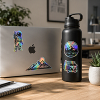 Autocollants holographiques personnalisés, imperméables, autocollants en vinyle laser 3D arc-en-ciel, étiquettes holographiques découpées au laser pour l'image de marque et l'emballage