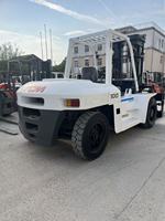 Chariot élévateur diesel 4x4 TCM FD100 d'occasion en excellent état, 10 tonnes, avec mât à 2 ou 3 étages en option, hauteur de levage de 4,5 m, pneus pleins