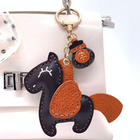 Nouveau design, pendentif animal en cuir véritable pleine fleur, breloque de sac et porte-clés mignons, doux et originaux, couleur et logo personnalisables