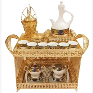 2022 new arrival habesha ethiopian golden metal rekebot table coffee tray set with porcelain tea cups and saucers