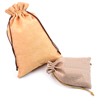 Nouvel arrivage Pochette en toile de jute couleur nature Pochette à bijoux de haute qualité Sac à bonbons en lin réutilisable pour les fêtes de fin d'année