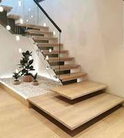 Escalier moderne en bois de chêne blanc massif avec marches flottantes et éclairage LED pour appartement et villa