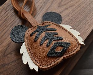 Porte-clés en cuir véritable de luxe personnalisé Zenos, forme irrégulière, pendentif tigre, pour accessoires de voiture et de sac à main - Product Image 6