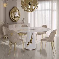 Ensembles de tables à manger ovales avec plateau en marbre, base sculpturale blanche et incrustations dorées, vente en gros, personnalisables