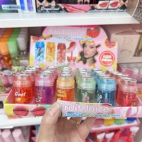 Vente en gros Huile liquide pour les lèvres à la fraise 6 couleurs changeantes Récipient végétalien Rouge à lèvres hydratant Brillant à lèvres Maquillage de fille en vrac