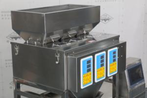 Máquina de envasado de 3 cabezales para bolsas doypack preformadas con báscula para semillas, granos y azúcar - Product Image 2