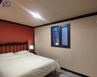 Maison conteneur préfabriquée de luxe à 3 chambres, 40 pieds, en bois, mobile, pliable et extensible, avec véranda latérale, en gros, à vendre