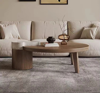 Table basse simple en noyer avec plateau circulaire en verre, style italien créatif pour salon