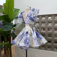 Robe élégante pour femme en organza imprimé avec nœud papillon et dos nu, collection 2026, vente en gros pour boutiques