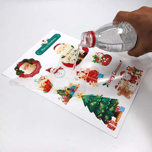 Feuille d'autocollant <span class=keywords><strong>de</strong></span> décoration <span class=keywords><strong>de</strong></span> Noël personnalisé A4 A5 A6 taille brillante/mate/pailletée film laminé imperméable vinyle impression baiser coupe - Product Image 1