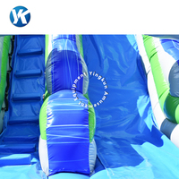 Structure gonflable commerciale pour jardin, avec toboggan aquatique tropical, château sauteur et zone de saut, en bâche PVC 0,55 mm