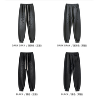 Pantalon de jogging unisexe imprimé effet éclaboussures, coupe fuselée, taille élastique avec cordon de serrage, poches latérales, bas de jambe à revers, style streetwear, effet vieilli, personnalisable, vente en gros