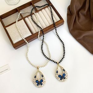 Vintage Butterfly Pendant Necklace Long Chain Gemstone Sweater Chain For Women Fashion Jewelry Accessories White And Black Color - Product Image 1