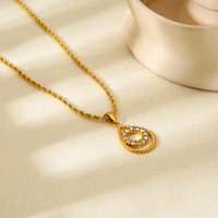Collier tendance en zircon en acier inoxydable plaqué or 18 carats avec chaîne à maillons pendentif goutte d'eau torsadé creux et ensemble de boucles d'oreilles cadeau