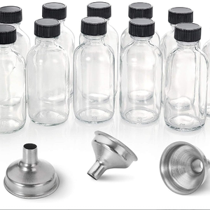 Vente en gros de flacons de Boston miniatures de 2 oz (60 ml) en verre transparent pour potions, jus, bien-être, shots de gingembre, liquides de whisky, essentiels de voyage - Product Image 1