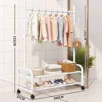 Vente en gros support personnalisé portable sur pied cintres en métal pour chambre à coucher accrocher vêtements porte-manteaux