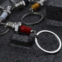 Porte-clés créatif en métal en forme de bougie d'allumage pour hommes, vente en gros de pièces automobiles, pendentif breloque pour hommes