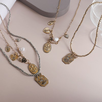 Collier multicouche rétro YEHHY avec pendentif cœur en perle rose, chaîne de clavicule de luxe, accessoire élégant