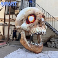 Crâne à yeux rouges gonflable lumineux LED sur mesure, grand accessoire squelette gonflable effrayant pour la décoration extérieure de Halloween et de carnaval