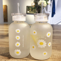 Vente en gros Tasses en verre avec marguerite florale Bouteille d'eau transparente en verre borosilicaté Tasse à café de voyage givrée