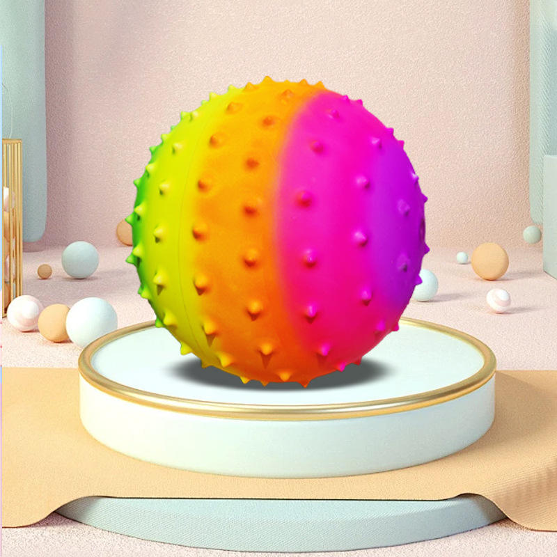 Bola de espinas arcoíris de 15 cm.