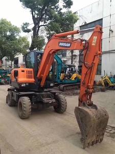 Excavadora de ruedas Doosan DX60W Original usada Doosan DX60 DX55W Micro Mini excavadora de ruedas May Xuc con Dozer a la venta - Product Image 2