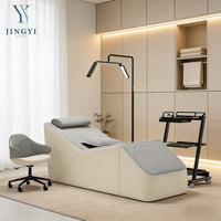 Table et lit de massage incurvés JingYi pour salon de beauté, lit de beauté pour cils, table de massage pliable pour soins du visage, lit pour extensions de cils