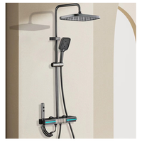 Nouvel ensemble de douche thermostatique mural TikTok avec affichage numérique LED lumineux, quatre fonctions et jet de pluie, finition bronze canon