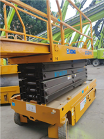 Plateforme élévatrice à ciseaux électrique XCMG GTJZ1212 d'occasion, hauteur de plateforme 12m, capacité 320kg, autopropulsée, pour entrepôt et construction