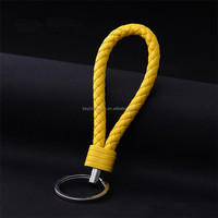 Moule de bonne qualité Logo en métal personnalisé tissage fait à la main en cuir tressé corde voiture porte-clés avec plaque en métal