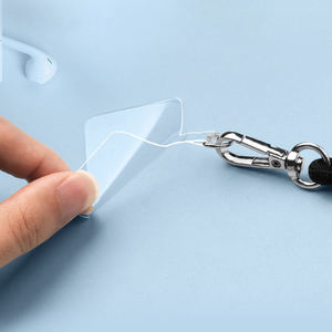 Venta al por mayor de parches transparentes de TPU para teléfono móvil, pestañas transparentes universales para teléfono móvil, cordón cruzado para teléfono móvil - Product Image 1