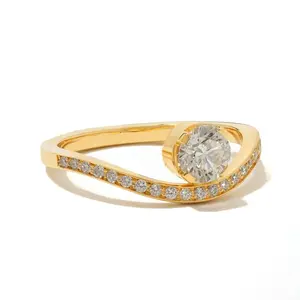 Gemnel elegant and striking design handmade 18K gold curved diamond band with a larger gem engagement ring