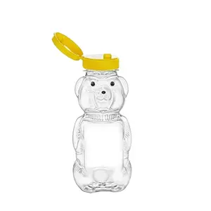 Vente en gros 8OZ 12OZ 16OZ Bouteille à presser en plastique en forme d'ours transparente Emballage de miel avec bouchons