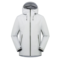 Veste Softshell Imperméable Coupe-Vent de Haute Qualité pour Hommes, Idéale pour la Randonnée et la Pêche en Extérieur, Col Montant, Logo Frontal, à Capuche